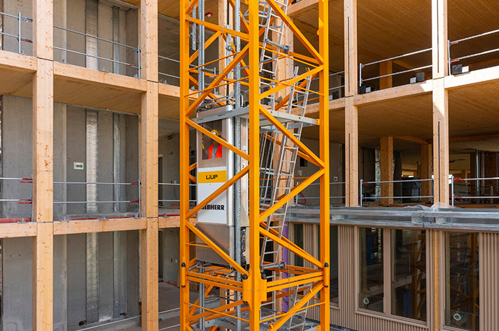 Ten Liebherr tower cranes are helping to build the largest timber campus in Europe